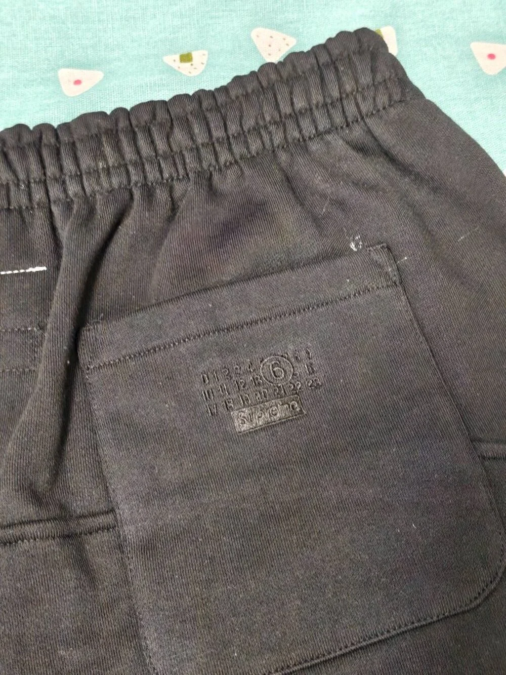 Supreme Black Sweatpants with Eagle Graphic and Tan & Blue Accents